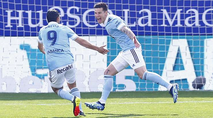 Santi Mina (Celta Vigo) sút rất nhanh về phía khung thành sau khi nhận được bóng từ một đường chuyền xé toang hàng phòng ngự của một đồng đội. Cú sút của anh đưa bóng chuẩn xác vào phía trong cột dọc bên trái, trong sự bất lực của thủ môn đối phương!