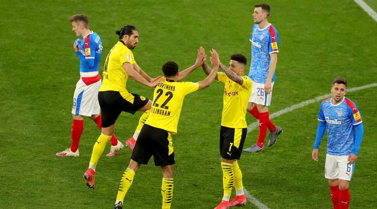 Vào! Jadon Sancho chuyền bóng đến chân Jude Bellingham (Dortmund) và cầu thủ này tung một cú sút từ rìa vòng cấm. Bóng bị một cầu thủ khác làm đổi hướng, khiến thủ môn Thomas Dahne không kịp trở tay. Tỉ số là 5:0.